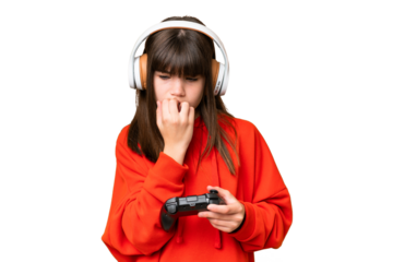 Little caucasian girl playing with a video game controller over isolated background having doubts