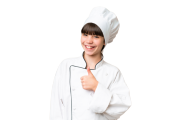 Little caucasian chef girl over isolated background giving a thumbs up gesture