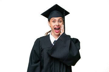 Young university graduate  caucasian woman over isolated background with surprise and shocked facial expression