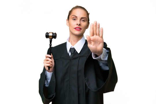 Judge caucasian woman over isolated background making stop gesture