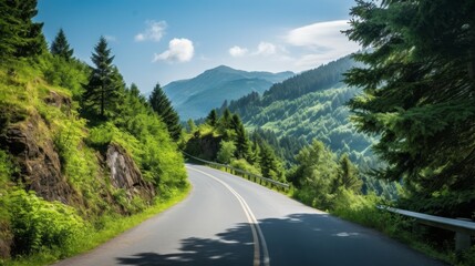 Naklejka premium asphalt wavy mountain road green trees clouds vacation.