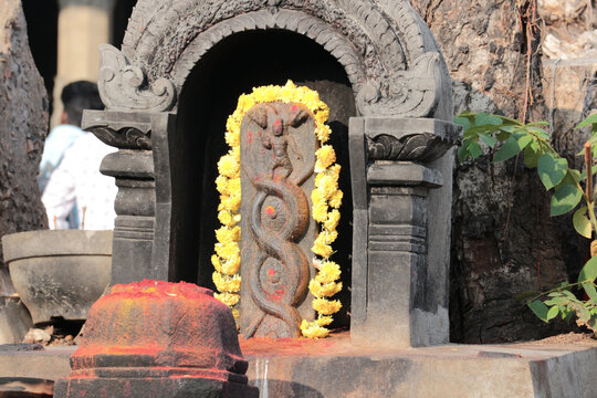 Naga snake worship altar in southern India. - Powered by Adobe
