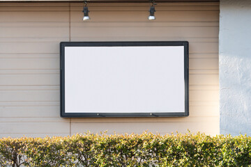 Large blank billboard on a street wall, banners with room to add your own text