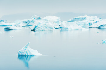 Icebergs in Atlantic ocean, Ilulissat icefjord, western Greenland.