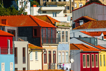 Colorful architecture with red tile rooftops in Porto, Portugal.