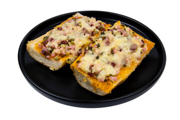 sandwiches with vegetables and cheese on a black plate isolated on white