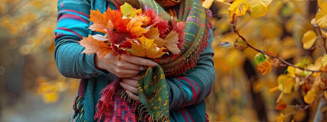 woman holds autumn leaves in her hands. Selective focus. - Powered by Adobe