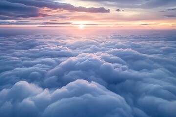 Photograph of an endless sea of clouds, seen from above in soft colors