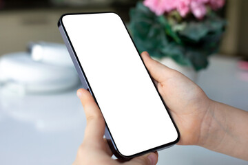 children hands hold phone with isolated screen background of headphones