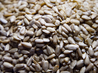 Healthy Snack Texture. Textured sunflower seeds, suitable for dietary and wellness themes.