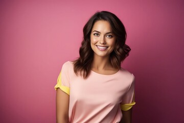 Fototapeta premium A beautiful woman in pink shirt and yellow pants.