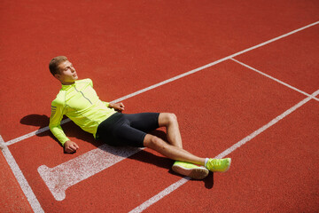 professional sports running, Sport and Olympic Games, a guy is jogging at the stadium