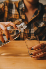healthy beautiful young woman holding glass of water