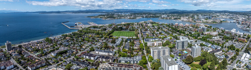 panoramic aerial view James Bay District in Victoria the capital of British Columbia with MacDonald Park, Victoria Inner Harbor and the  West Bay district in background