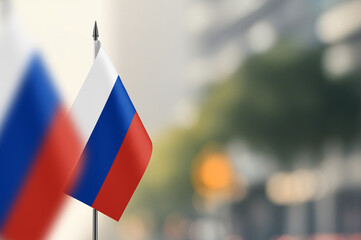 Small flags of Russia on a blurred background