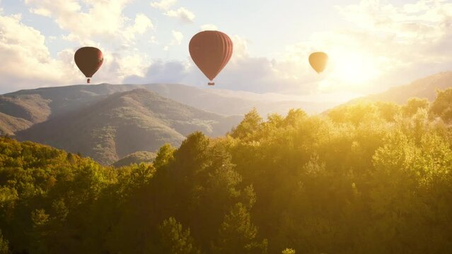 Colourful Red Blue Yellow Colours Hot Air Baloons Aerial Drone Flight Over Beautiful Autumn Forrest at Sunet Mountains Beautiful Landscape Background Sunny Vacation Travel Destination Concept