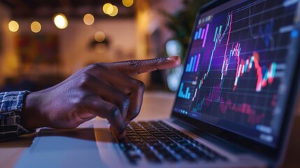A Hand Analyzing Stock Market Charts