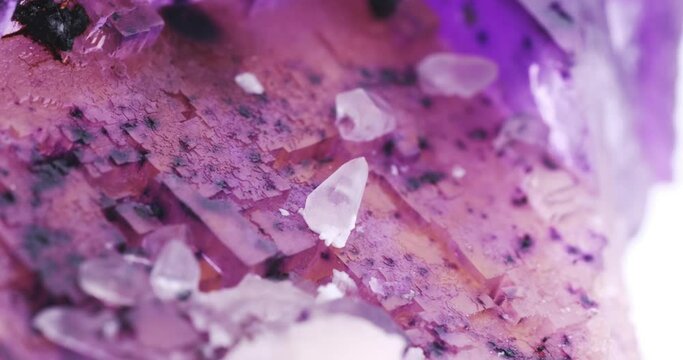 Purple and yellow Fluorite with white calcite footage. From USA. macro detail close-up rough raw unpolished semi-precious gemstone. 