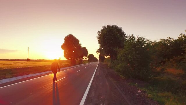 Business Sunset Road Man Way Businessman Work Sky Success Job Street Travel Future Walk Countryside Nature Sunrise Concept Cloudy Male Worker Positive Direction Field Aerial UHD 4K