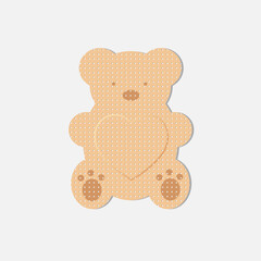 Teddy bear plaster for wounds, vector
