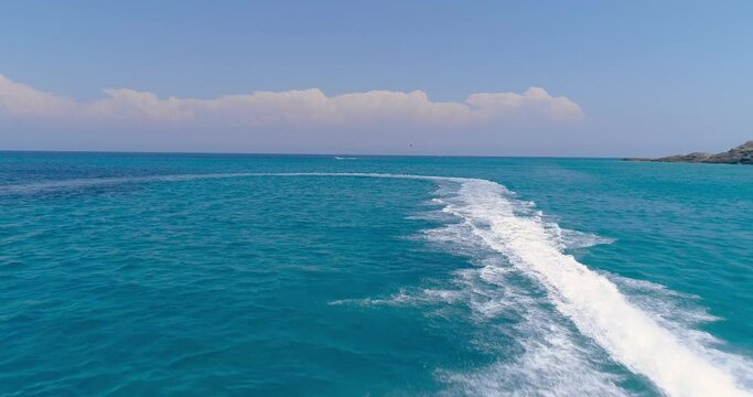 Aerial View Over Man Speeding On Jet Ski Tourist Attraction Exotic Tropical Island Shore Beach At Exotic Greek Island Extreme Sports Vacation Trip Tourism Sport Attraction Paradise Adventure Concept H