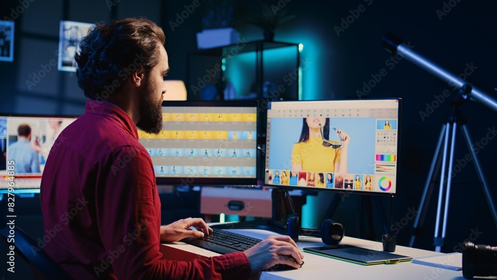 Poster photographer using software on computer to perform editing operations, correcting images in creative