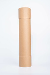 Brown cardboard cylinder tube for shipping isolated on white background