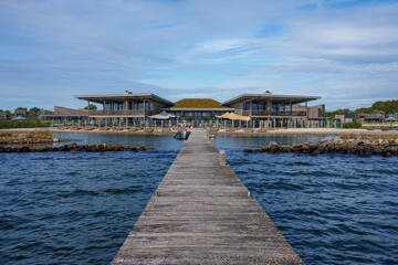 Lakeside Modern Architecture: Wooden and Glass House from Pier View