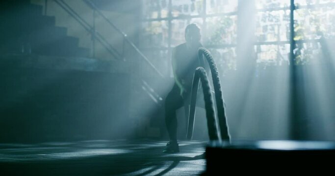 Attractive Muscular Female Battling Rope Workout At The Gym Functional Training Motivation Crossfit Focus Success Concept 4k