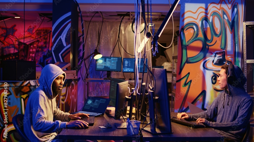 Poster hacker arriving in underground base, ready to do computer sabotage using encryption trojan ransomwar