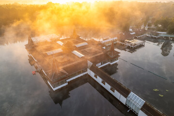 Thermal Lake Heviz at sunrise in Hungary, aerial view