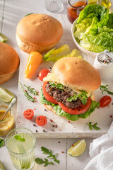 Tasty grilled cheeseburger baked on a grilled.