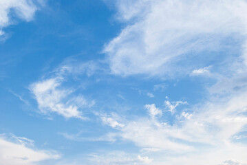 gentle clouds in the blue sky
