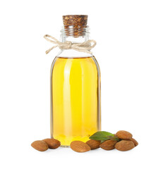 Bottle of almond oil and fresh nuts isolated on white