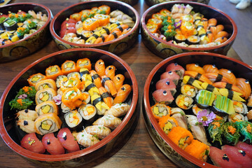 Sushi and rolls in Bento Lunch box, Japanese food. Sushi lovers