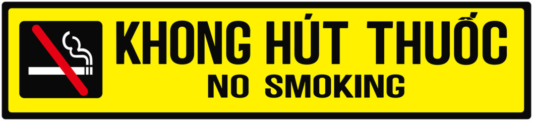 Yellow sign informing that smoking is prohibited in english and Vietnamese language. No smoking . Vietnam