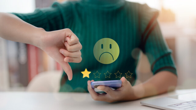 Women chose a 1-star rating review in the survey on the virtual touch screen on smartphones. A bad review, bad service dislike bad quality, low rating, social media not good