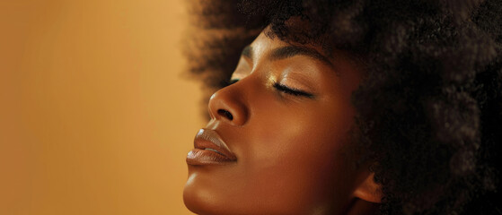 Obraz premium beautiful portrait of black brown woman model with natural face, afro shining curly hair, skin care and cosmetics on brown studio background