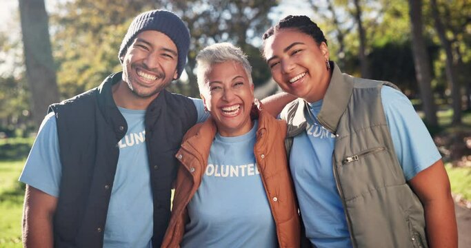 Happy people, volunteer and team with hug in nature for community service, support or better future. Portrait or group of workers with smile in NGO for care, embrace or eco friendly environment