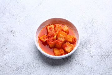 Korean traditional food kkakdugi against a bright background