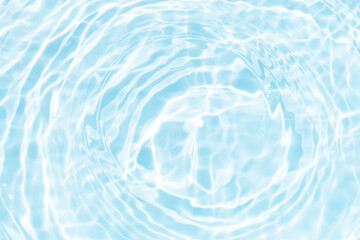 Blue water with ripples on the surface. Defocus blurred transparent blue colored clear calm water...