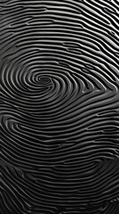 Closeup photograph showcasing the intricate, distinctive lines and whorls of a fingerprint on a solid black surface. Personal, identification-based theme