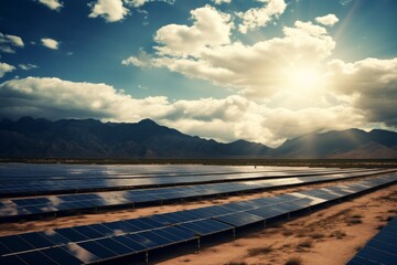 Solar Panels Set against a Spectacular Backdrop of Mountains and Clouds
