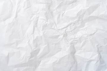 Wrinkled or crumpled white stencil or tissue paper texture used for crumpled paper background...