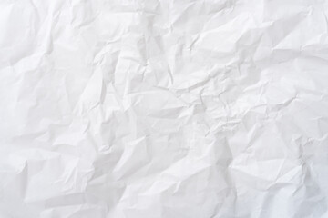 Wrinkled or crumpled white stencil or tissue paper texture used for crumpled paper background texture