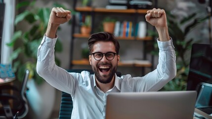 Obraz premium Energetic Young Professional Celebrates Accomplishments at Modern Desk