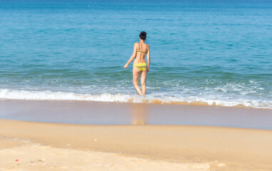 Fototapeta premium Happy women on the beach.Travel and lifestyle Concept. Happy People enjoy and chill vacation