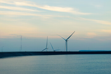 wind turbines produce electricity, clean energy.