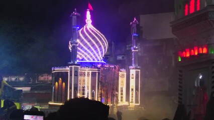 Tazia procession muharram ashura ceremony martyrdom of Imam Hussain. 9th and 10th Nighttime Tajia procession Ashura commemoration events siddi dhammal chokra real-time footage.