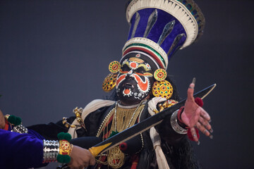 Kathakali dancer depicting evil character